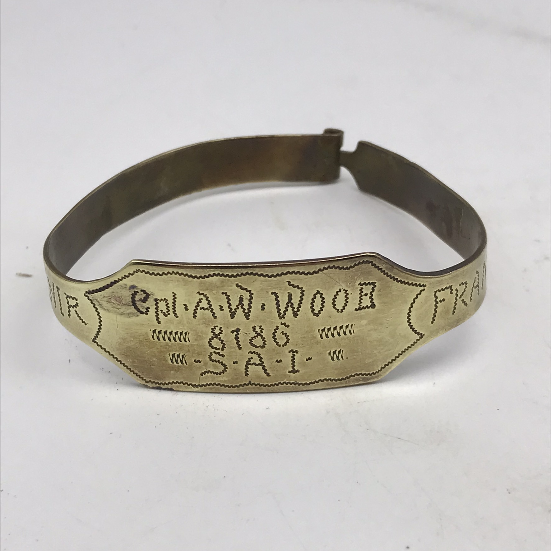 WW2 - POW/Trench Art Brass Bracelet (Cpl. A.W. WOOD)